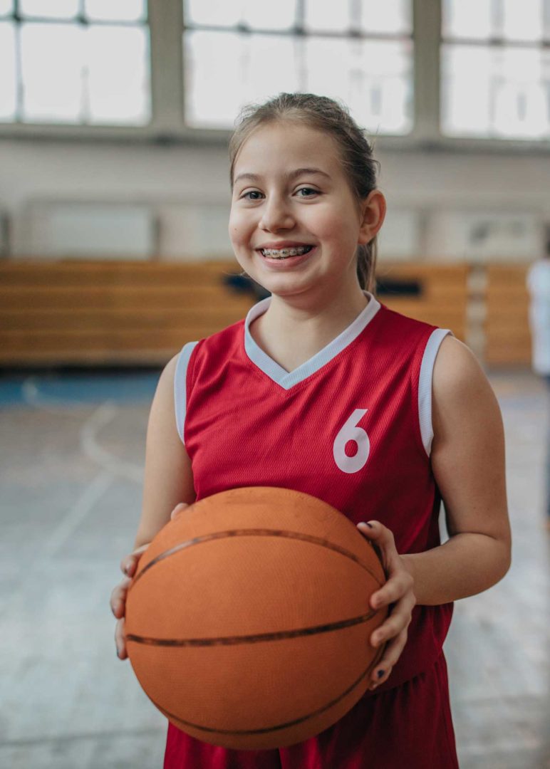 Female Basketball Player with Braces
