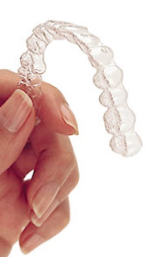 holding_invisalign